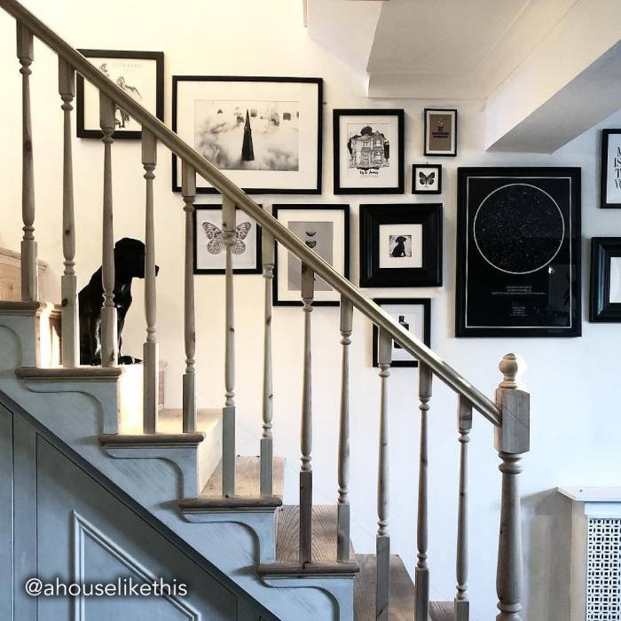 gallery wall idea on stair case with star map